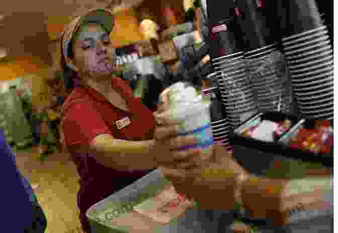 A Dunkin' Donuts Employee Preparing A New Coffee Beverage Around The Corner To Around The World: A Dozen Lessons I Learned Running Dunkin Donuts