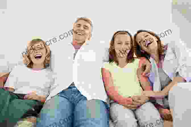 A Family Sitting On A Couch, Laughing. The Father Is In The Center, With His Wife And Children On Either Side. He Is Smiling And Has His Arms Around His Wife And Children. My Fathers Houses: Memoir Of A Family
